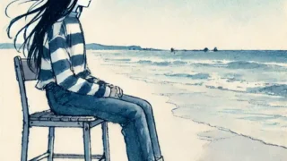 海を見ている女子